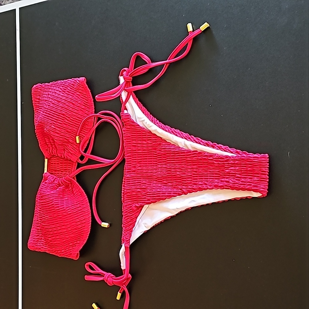 Women's smocked bikini with tie sides.